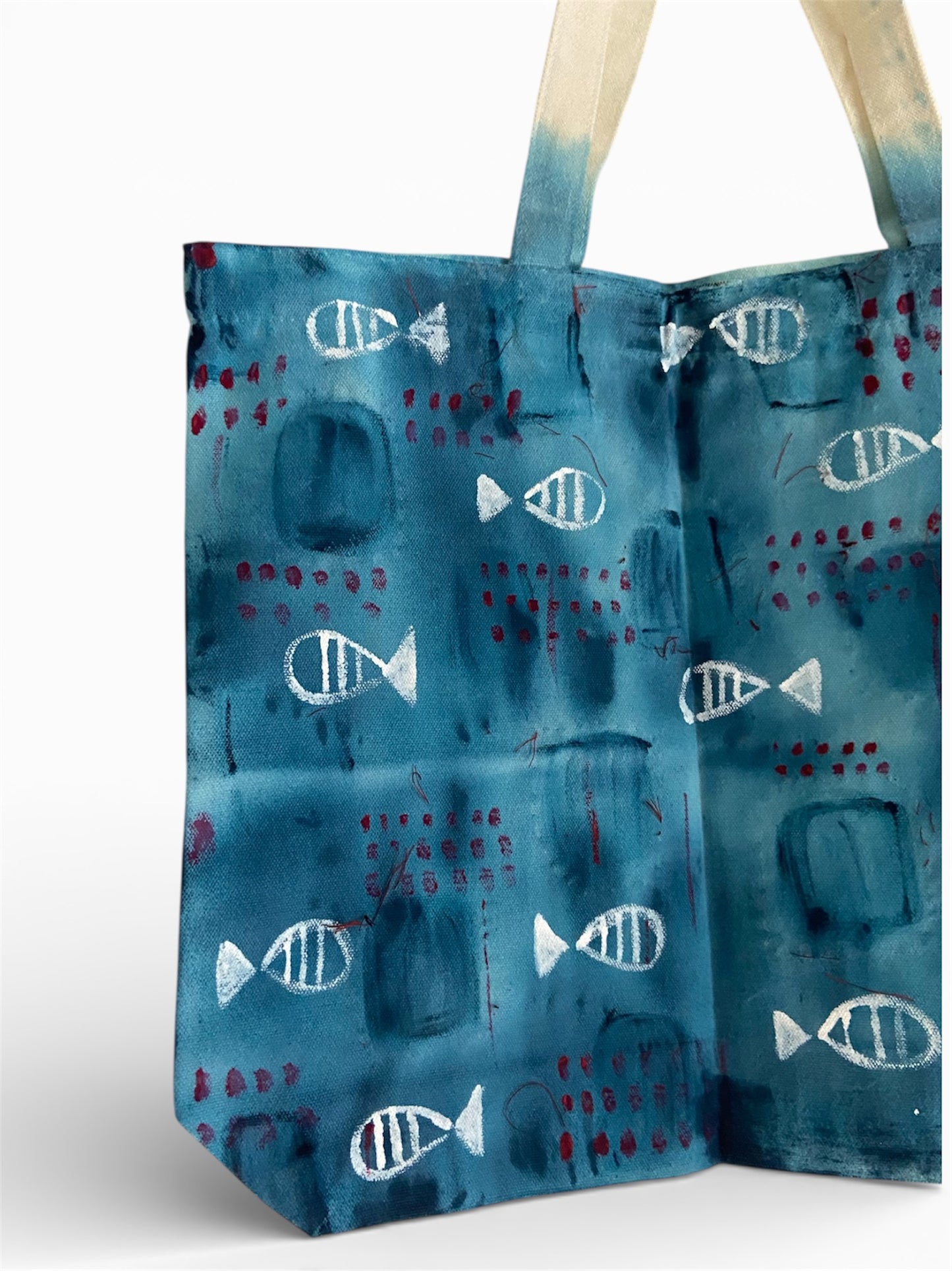 Hand-Painted Fish Motif Tote Bag featuring unique hand-painted fish designs in blue and white.